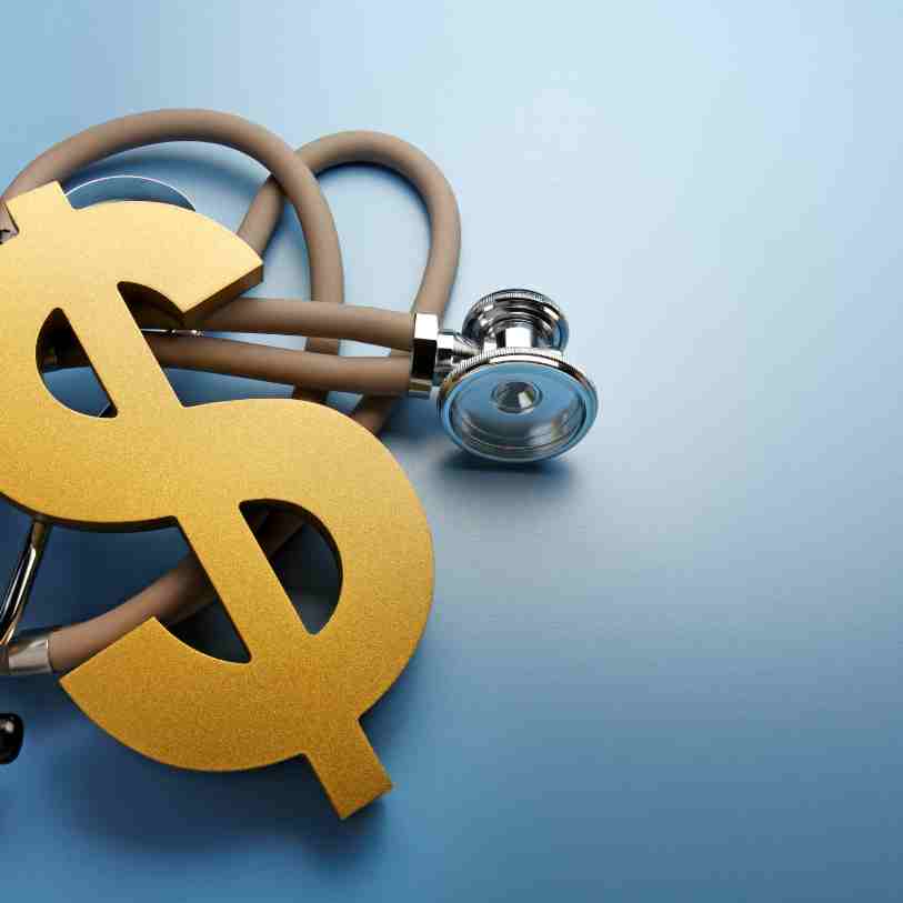 Dollar sign placed on a stethoscope to symbolize paying for nursing care with medicaid