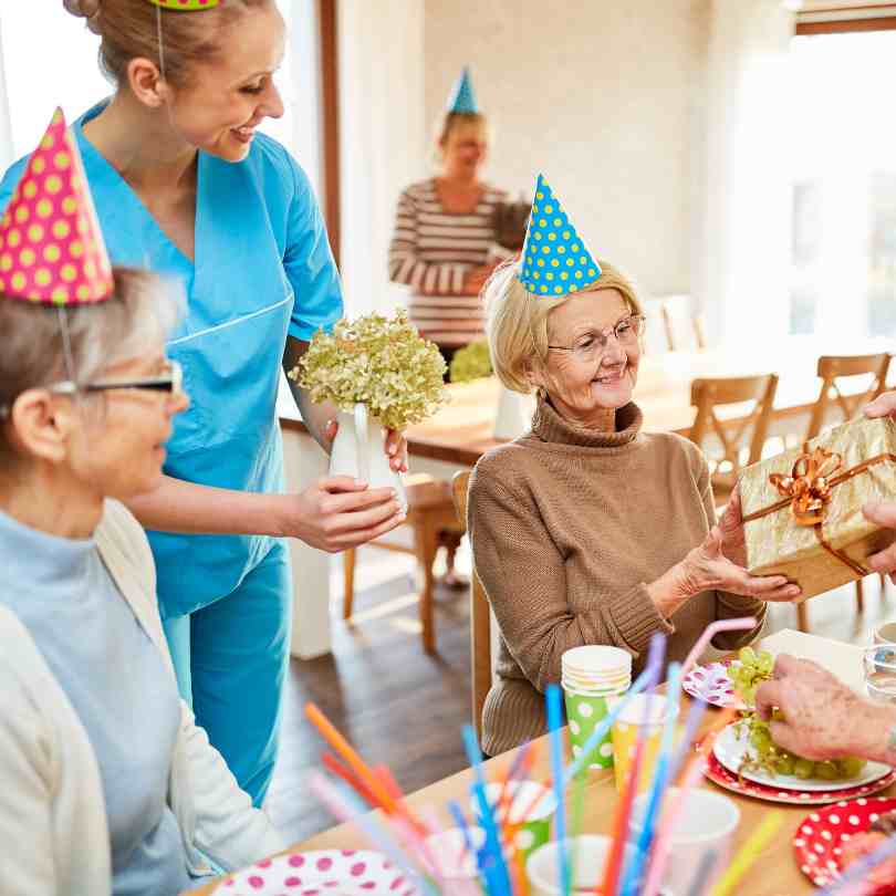caregiver coordinating party games for elderly people